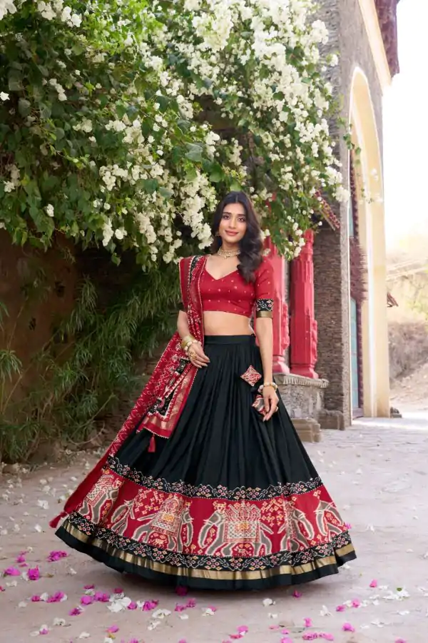 Superb Black Color Tushar Silk Patola Printed Lehenga Choli