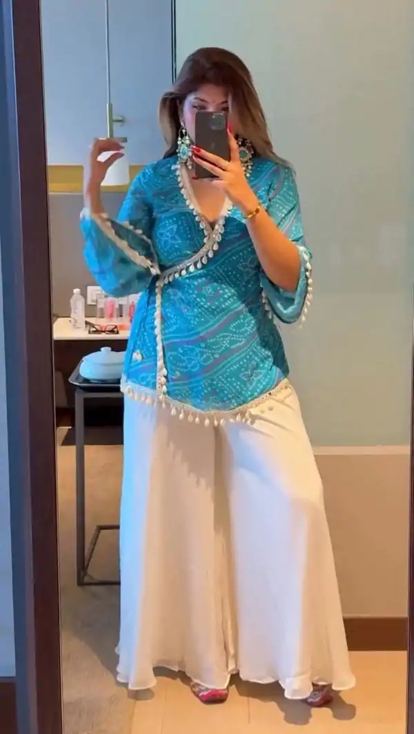 Sky Blue Georgette Cowrie Lace Work Salwar Suit